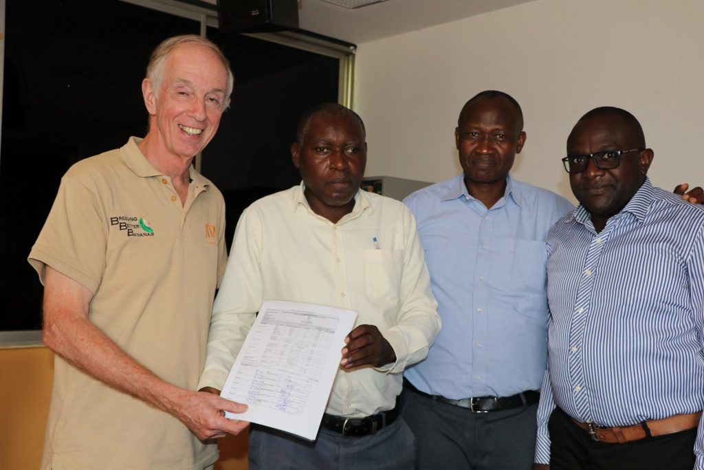 The country banana research leads handing over the signed protocol to Dr Rony Swennen. (Photo: G.Ndibalema/IITA).