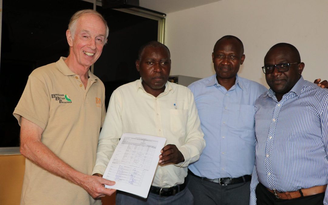 The country banana research leads handing over the signed protocol to Dr Rony Swennen. (Photo: G.Ndibalema/IITA).